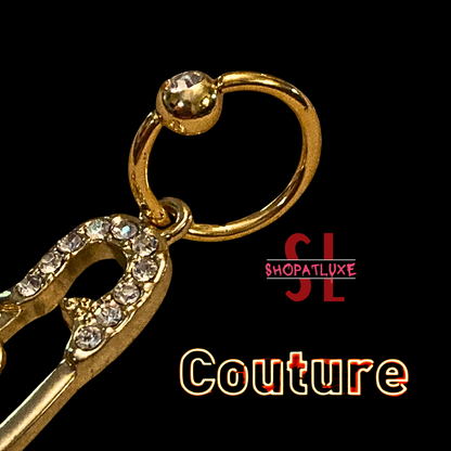 JUICY COUTURE SAFETY PIN WITH CAPTIVE BEAD RING